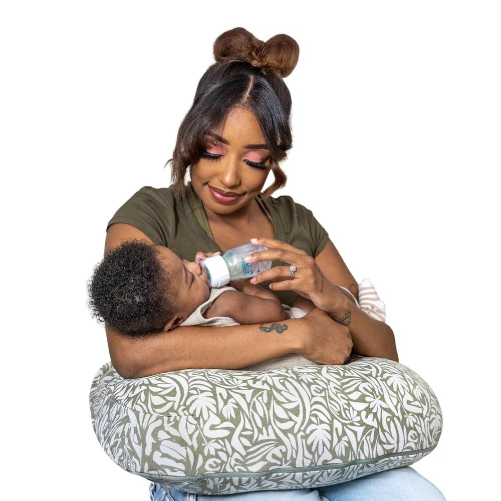 imageBoppy Nursing Pillow  Ergonomic Bottle ampamp Breastfeeding Pillow with High Firm Large Area WaterRepellent Cushion with Washable Cover Baby Safety Alliance Verified  Oatmeal BoucleOrganic  Green Cut Out Leaves
